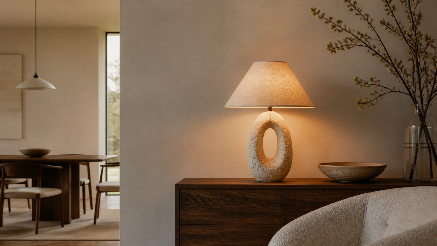 A warm modern living room with layered lighting